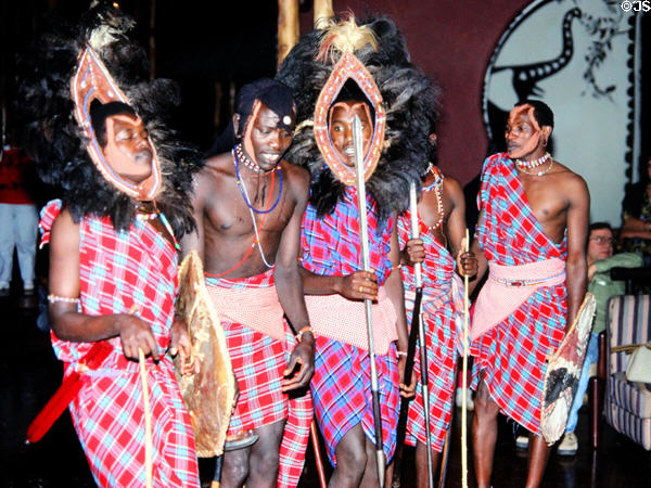 Masai dancers with traditional head dress in Amboseli National Park. Kenya.