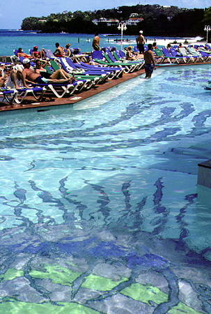 The pool and guests at the Sandals La Toc resort near Castries. St Lucia.