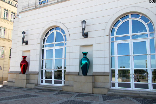 Two of several richly colored vases contrasting white stone of Court building. Luxembourg, Luxembourg.
