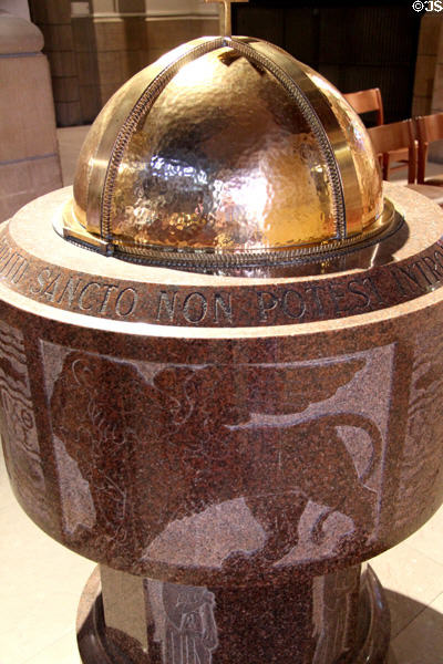Lion carving, representing St Mark Evangelist, on baptismal font at Cathedral of Our Lady. Luxembourg, Luxembourg.
