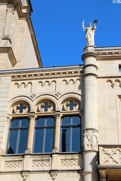 Statue of woman carrying crown & scepter on Chamber of Deputies. Luxembourg, Luxembourg.