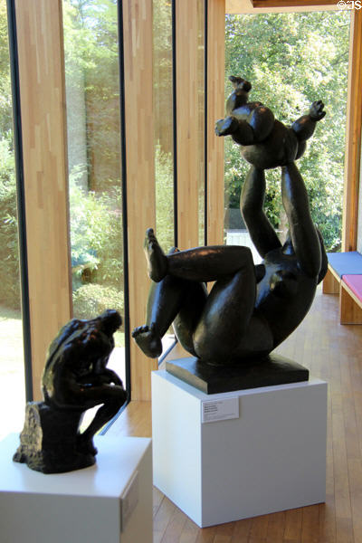 The Thinker sculpture by Auguste Rodin reproduction & Mother & Child bronze sculpture (1946) by Baltasar Lobo at Villa Vauban Museum. Luxembourg, Luxembourg.