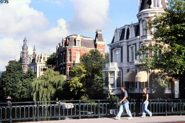 Houses along Singelgracht canal across from Rijksmuseum. Amsterdam, Netherlands.