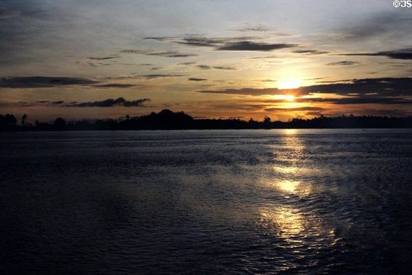 Sunset over the water of Sepik River. Papua New Guinea.