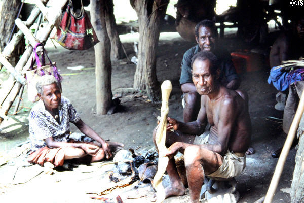 Carver showing off his work in Tambanam. Papua New Guinea.