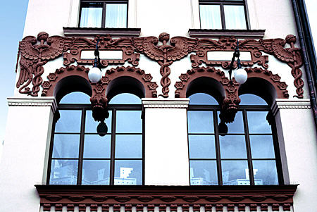 Detail of medical symbols on pharmacy next to Church of St Mary on Market Square, Krakow. Poland.