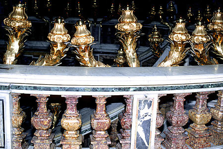 Railing on steps to Papal tombs in St Peter's, Vatican. Vatican City.