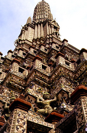 Wat Arun (Temple of Dawn) stands 82 meters tall across the river from Bangkok. Thailand.
