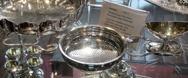 Silver strainer with two large handles (1782-3) by William Davie of Edinburgh at Museum of Edinburgh. Edinburgh, Scotland.