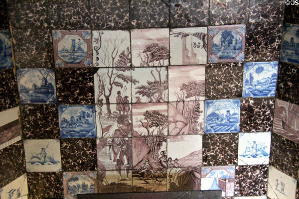 Fireplace tiles in Oak room at John Knox House. Edinburgh, Scotland.