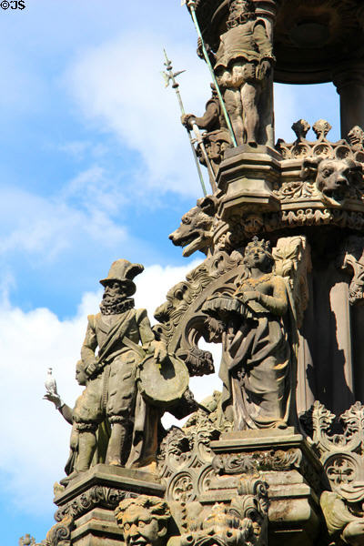 Drummer & reading queen on Holyrood Palace fountain. Edinburgh, Scotland.