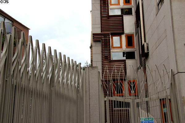 Fence with abstract vesica shape which represents both leaves & boats at Scottish Parliament. Edinburgh, Scotland.