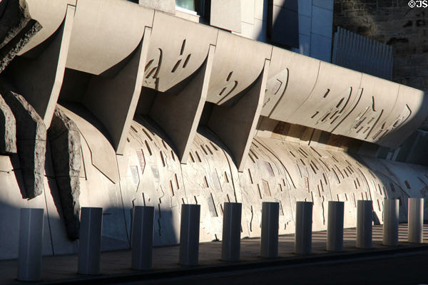 Sidewalk level of Royal Mile facade of Scottish Parliament. Edinburgh, Scotland.