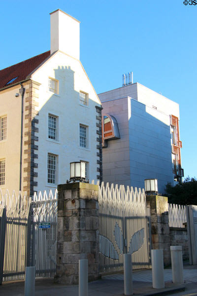 Old & new structure of Scottish Parliament over gated entrance. Edinburgh, Scotland.