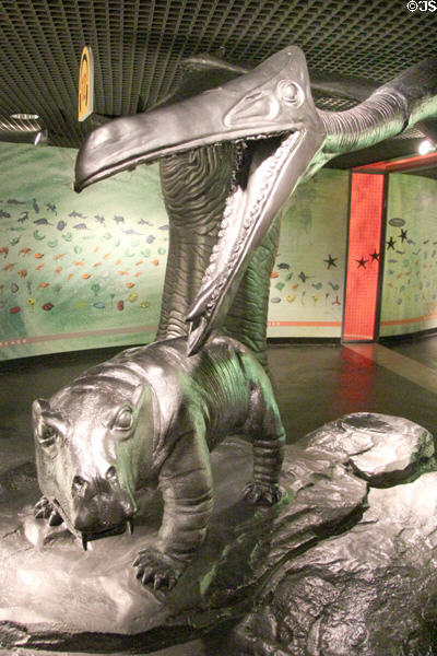 Model of Quetzalcoatlus flying reptile over Lystrosaurus our reptile ancestor of mammals at Our Dynamic Earth. Edinburgh, Scotland.