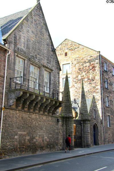 Heritage gate with pyramidal posts near Canongate on Royal Mile. Edinburgh, Scotland.