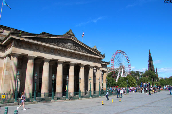 Royal Scottish Academy, Festival Wheel & Scott Monument along Princes Street. Edinburgh, Scotland.