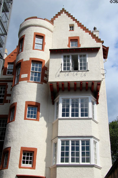 Red & white towered building on Royal Mile at corner of Edinburgh Castle. Edinburgh, Scotland.