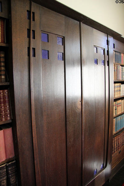 Cupboard with signature squares of C.R. Mackintosh in library at Hill House. Helensburgh, Scotland.