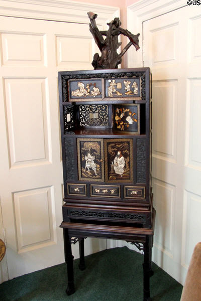 Oriental cabinet in business room at Pollok House. Glasgow, Scotland.
