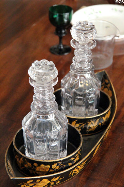 Stoppered wine bottles on stand in dining room at Culzean Castle. Maybole, Scotland.