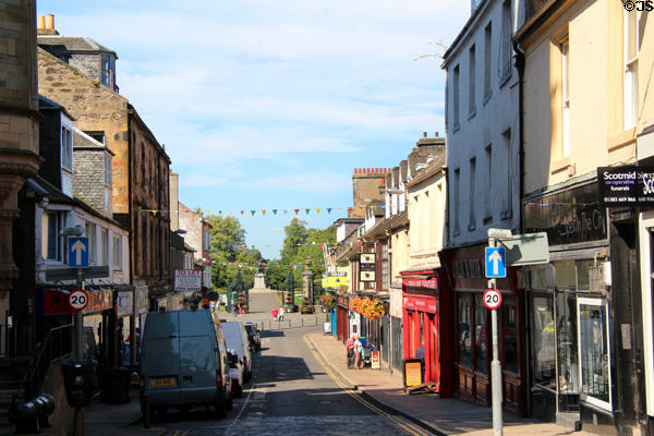 Statue of Andrew Carnegie in Pittencrieff Park seen along High Street. Dunfermline, Scotland.