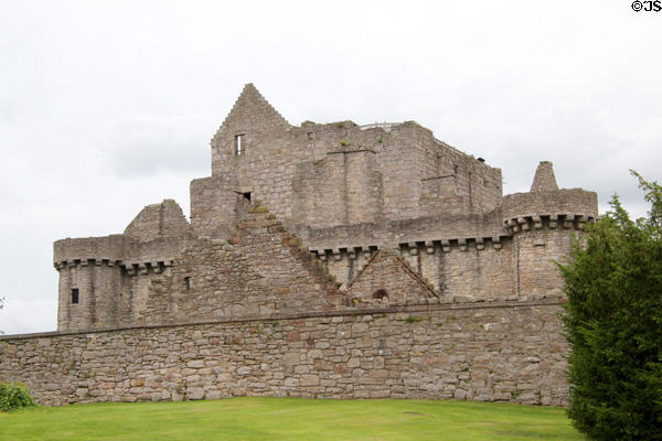 Tower house surrounded by walls at Craigmillar Castle. Craigmillar, Scotland.