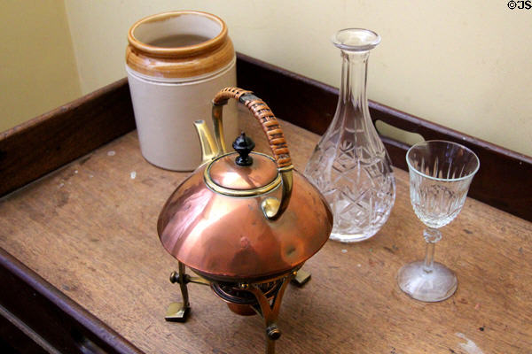 Copper & brass teapot with warming candle in service area at Hopetoun House. Queensferry, Scotland.