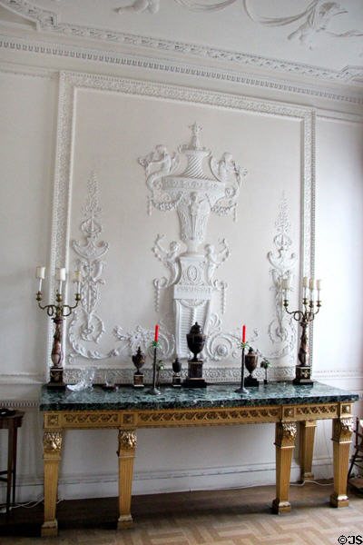 Adamesque sculpted wall panel over sideboard at Manderston House. Duns, Scotland.