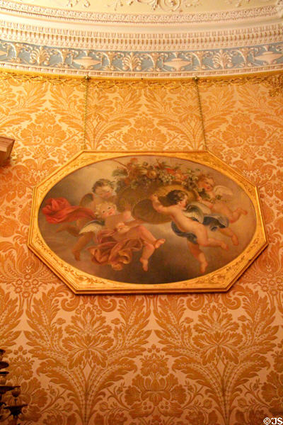 Painting of cupids on ballroom velvet wallpaper at Manderston House. Duns, Scotland.