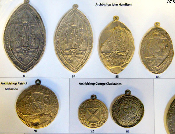 Collection of casts of seals of Archbishops of St Andrews in museum at St Andrews Cathedral. St Andrews, Scotland.