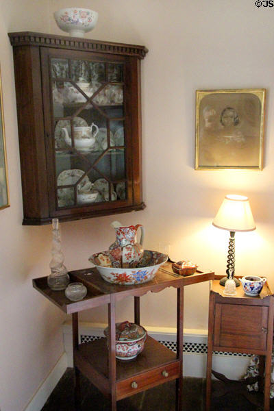 Washstand, pitcher & basin under china collection in Victorian bedroom at Crathes Castle. Crathes, Scotland.
