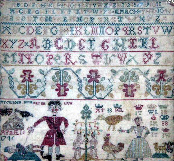 Sampler (1746) by young girl shows English red coat slaying a kilted Jacobite at Culloden (April 16, 1746) at Culloden Moor Visitor Centre. Culloden Moor, Scotland.