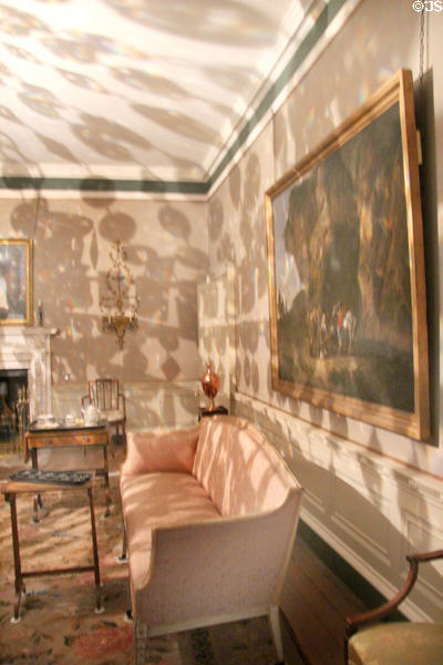 Drawing room with shadows from chandelier at Georgian House Museum. Bristol, England.
