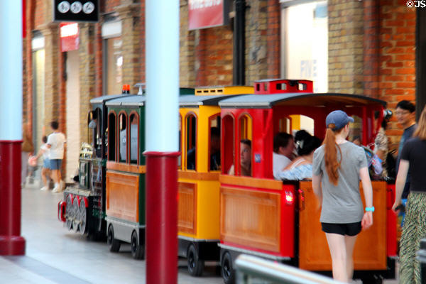 Small gauge train in shopping center adjacent to STEAM Museum of Great Western Railway. Swindon, England.