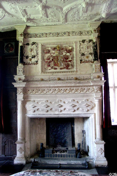 Ornate fireplace inset with Walter Jones's coat of arms in Great Chamber, designed to be most impressive room in the house at Chastleton House. Moreton-in-Marsh, England.