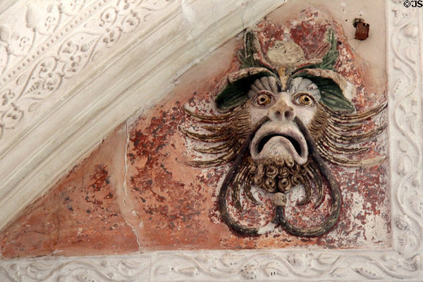 Monkey-like sculpted plaster face in Long Gallery at Chastleton House. Moreton-in-Marsh, England.