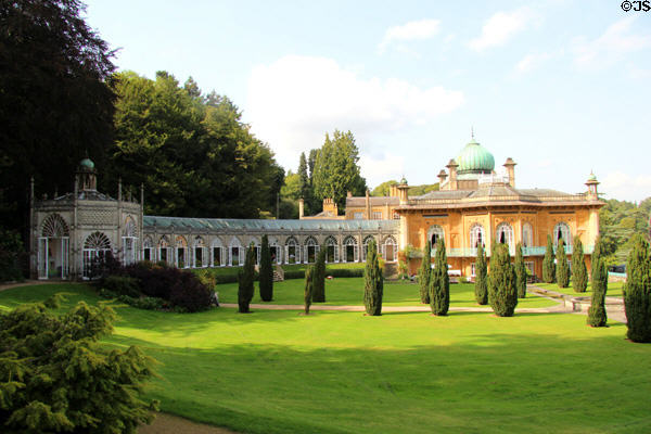 Expanse of lawn with Irish yews & fountain at Sezincote. Moreton-in-Marsh, England.