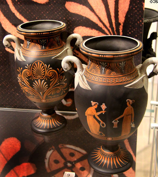 Black Basalt vases with swan handles & encaustic enamel (1785-90) by Wedgwood at World of Wedgwood. Barlaston, Stoke, England.