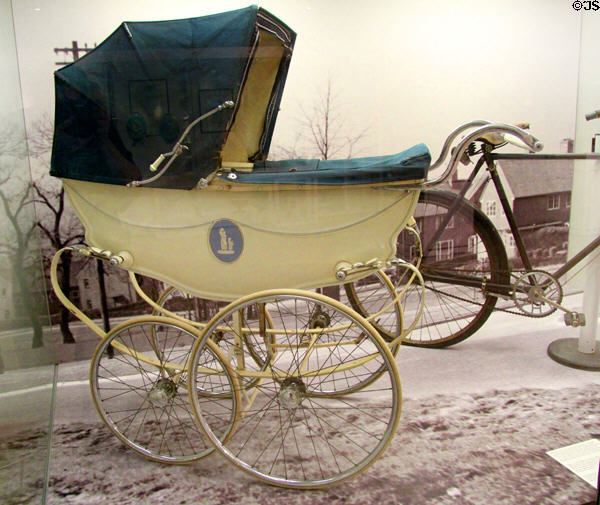 Silver Cross pram with Wedgwood Jasper plaque mounted on side at World of Wedgwood. Barlaston, Stoke, England.