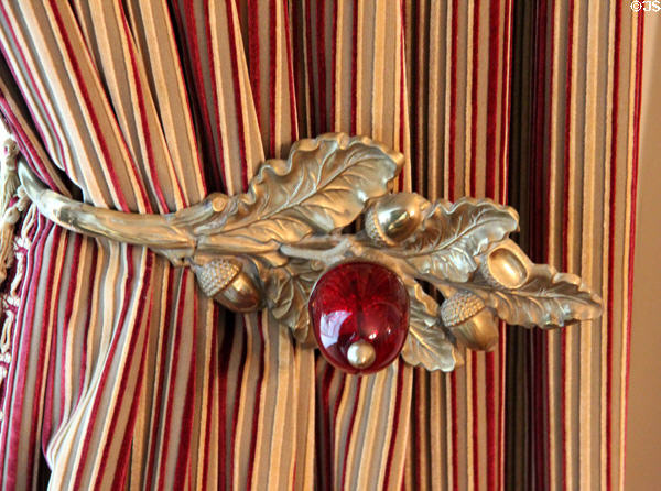 Acorn tie back on curtains made of Bohemian glass at Conde-Charlotte Museum. Mobile, AL.