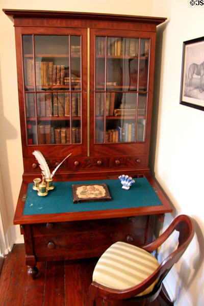 Desk with fold-open writing surface & bookcase at Conde-Charlotte Museum. Mobile, AL.