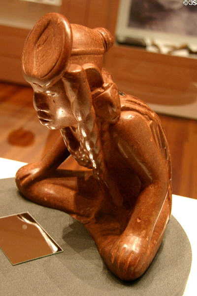 Clay seated male figure (c1000-1100 CE) from Cahokia Spiro Mound near St. Louis at Old State House Museum. Little Rock, AR.