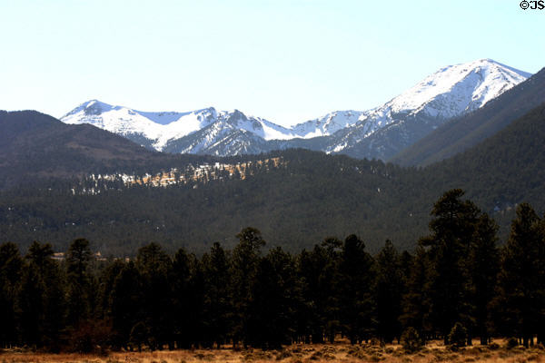 Snow-covered mountains seen from Sunset Crater. AZ.