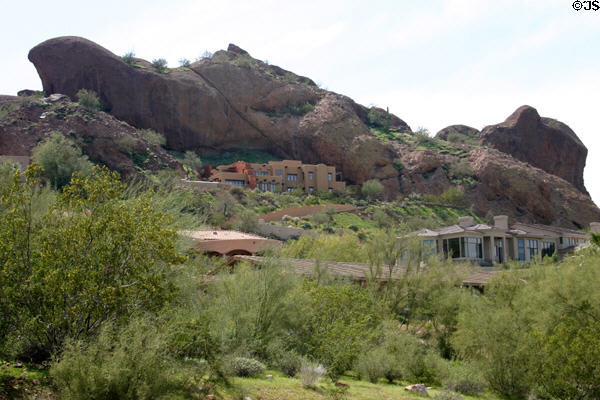 Modern houses below boulders of Echo Canyon Park. Phoenix, AZ.