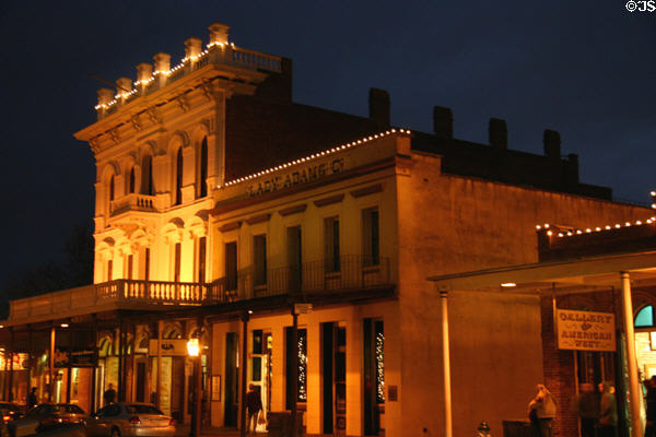 Italianate building (113 K St.) & Lady Adams Building (1852) (117-19 K St.) in Old Sacramento at night. Sacramento, CA.