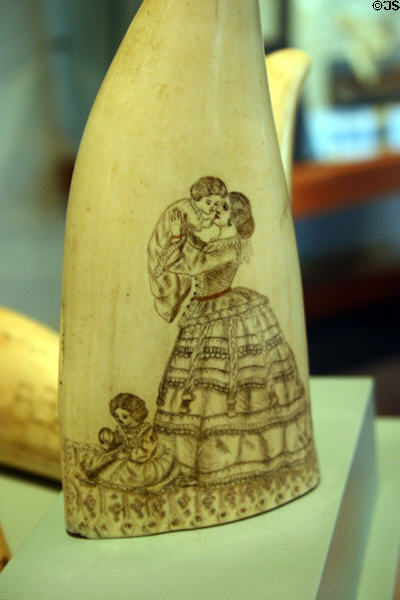 Scrimshaw etching of Victorian woman with children in Maritime Museum. Monterey, CA.
