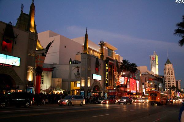 Hollywood Blvd. night streetscape from Mann's Chinese to First National Bank of Hollywood. Hollywood, CA.