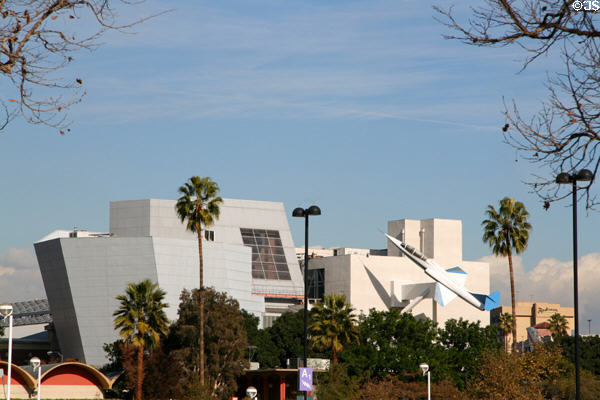 California Aerospace Museum (1982-4) with jet fighter cantilevered off front in Exhibition Park. Los Angeles, CA. Architect: Frank O. Gehry.