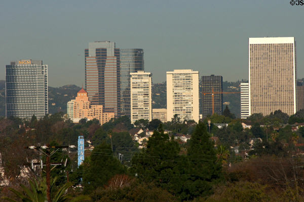 MGM (2003) (35 floors) [aka Constellation Place], Fox Plaza (1987) (34 floors), AIG (1990) (39 floors) [aka SunAmerica Center) tower over older highrises along Avenue of the Stars in Century City's Rancho Park including the pink Park Hyatt (1988). Century City, CA. Style: Postmodern. Architect: Johnson Fain.
